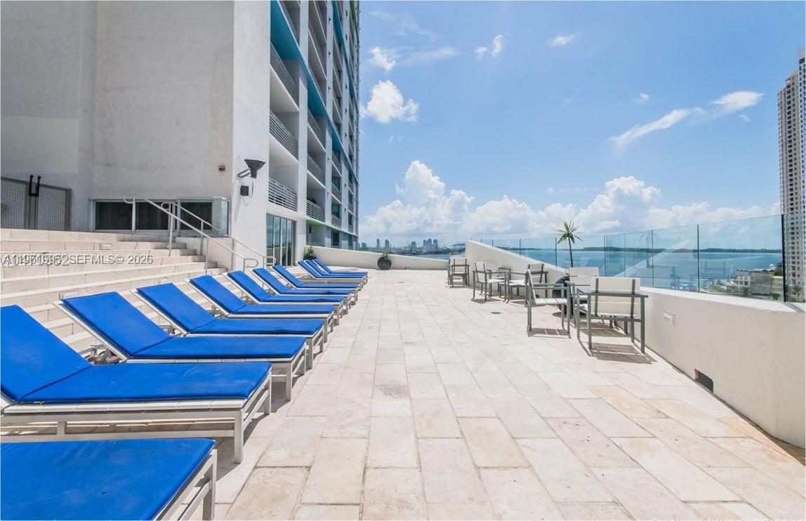 335 South Biscayne Boulevard, Unit 2212 Miami, FL 33131 - Photo 51 of 69 a view of a terrace with sitting area