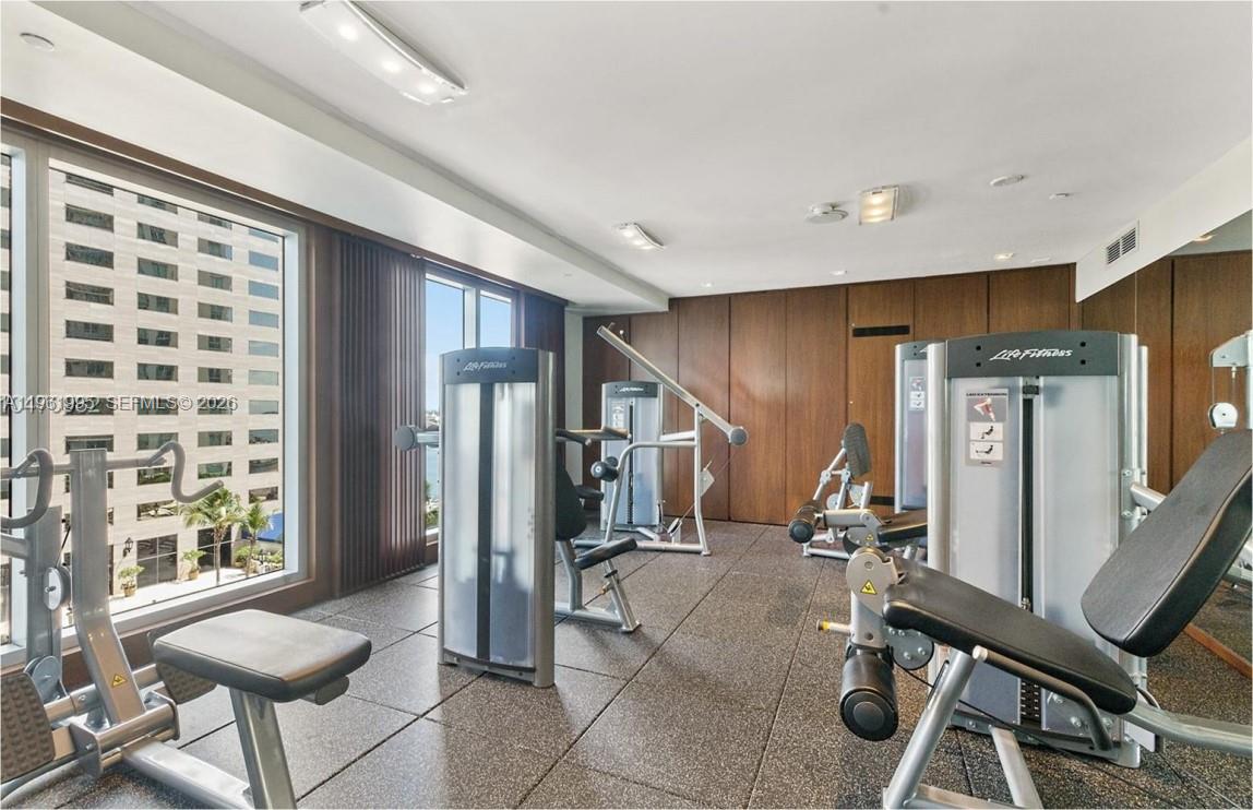 335 South Biscayne Boulevard, Unit 2212 Miami, FL 33131 - Photo 63 of 69 a view of a livingroom with furniture and a gym