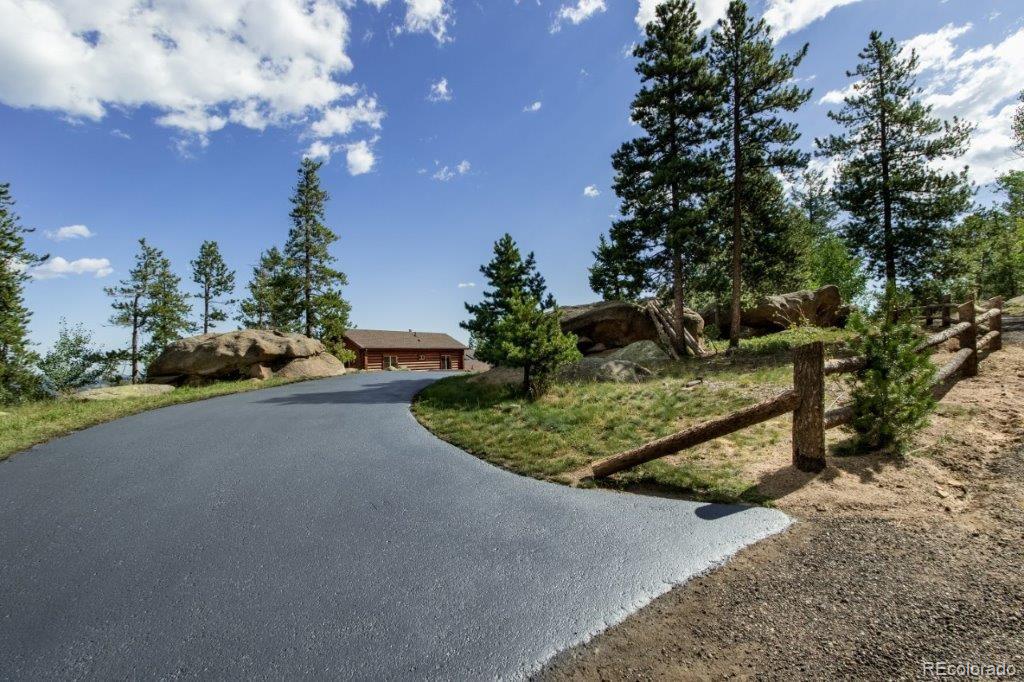 8044 Rossman Gulch Road Morrison, CO 80465 - Photo 13 of 34 a view of a garden