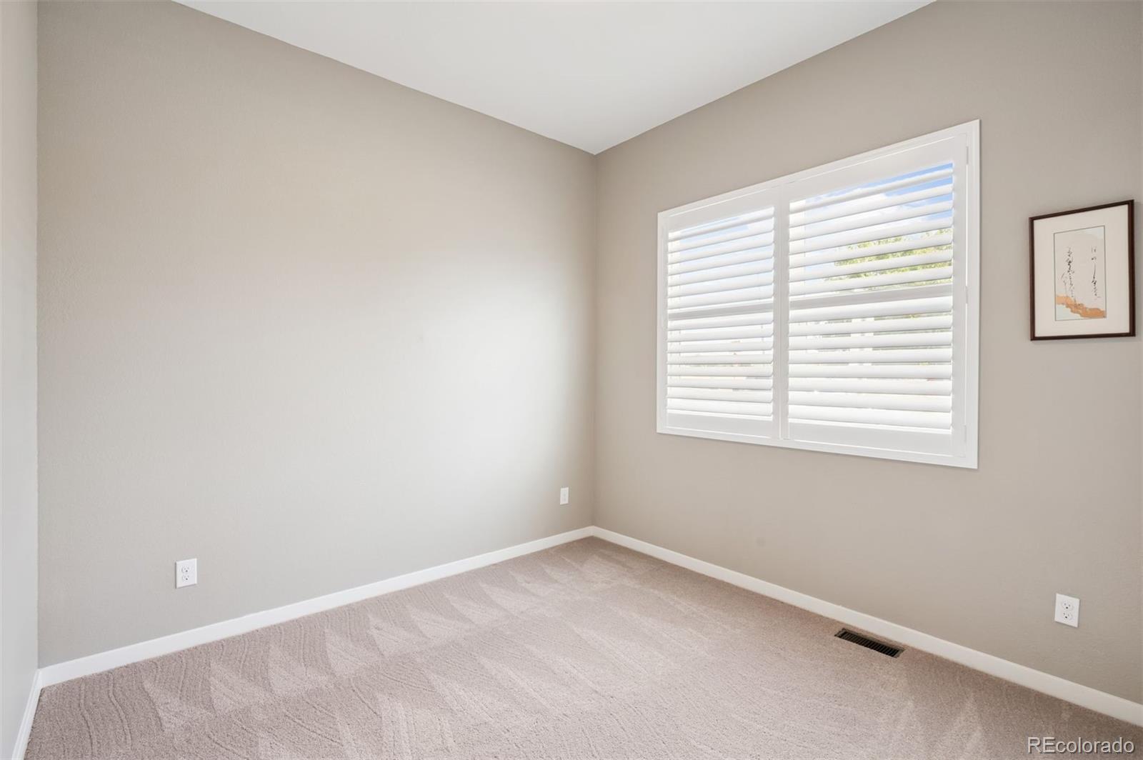 5795 Xenon Way Arvada, CO 80002 - Photo 25 of 33 an empty room with a window