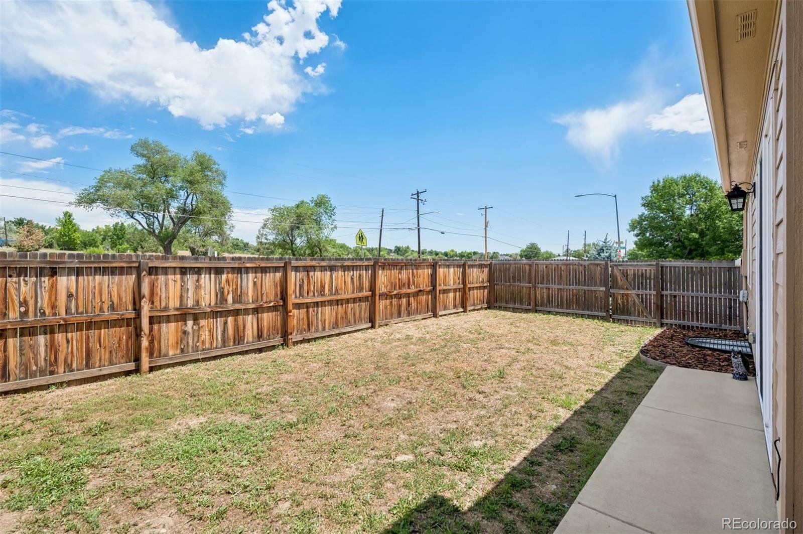 5795 Xenon Way Arvada, CO 80002 - Photo 32 of 33 a view of a backyard