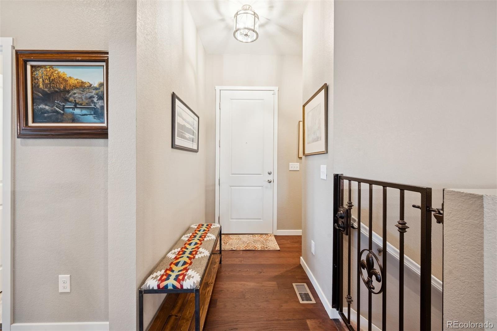 5795 Xenon Way Arvada, CO 80002 - Photo 8 of 33 a view of a hallway with entryway