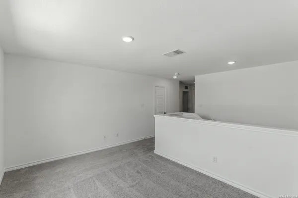 a view of a room with a furniture