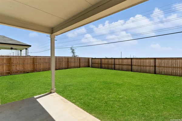 a view of a backyard with a garden