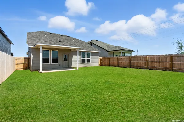 a view of a house with a garden