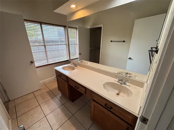 a bathroom with a bathtub toilet and sink