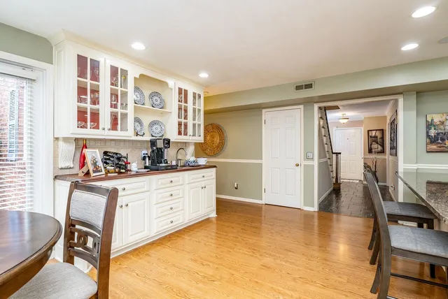 a kitchen with a sink and cabinets