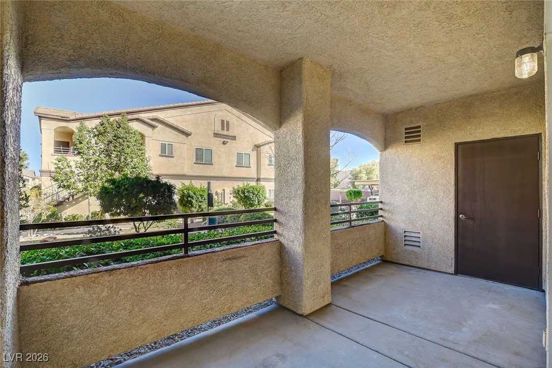 2291 West Horizon Ridge Parkway, Unit 7138 Henderson, NV 89052 - Photo 31 of 34 Covered patio with storage room.