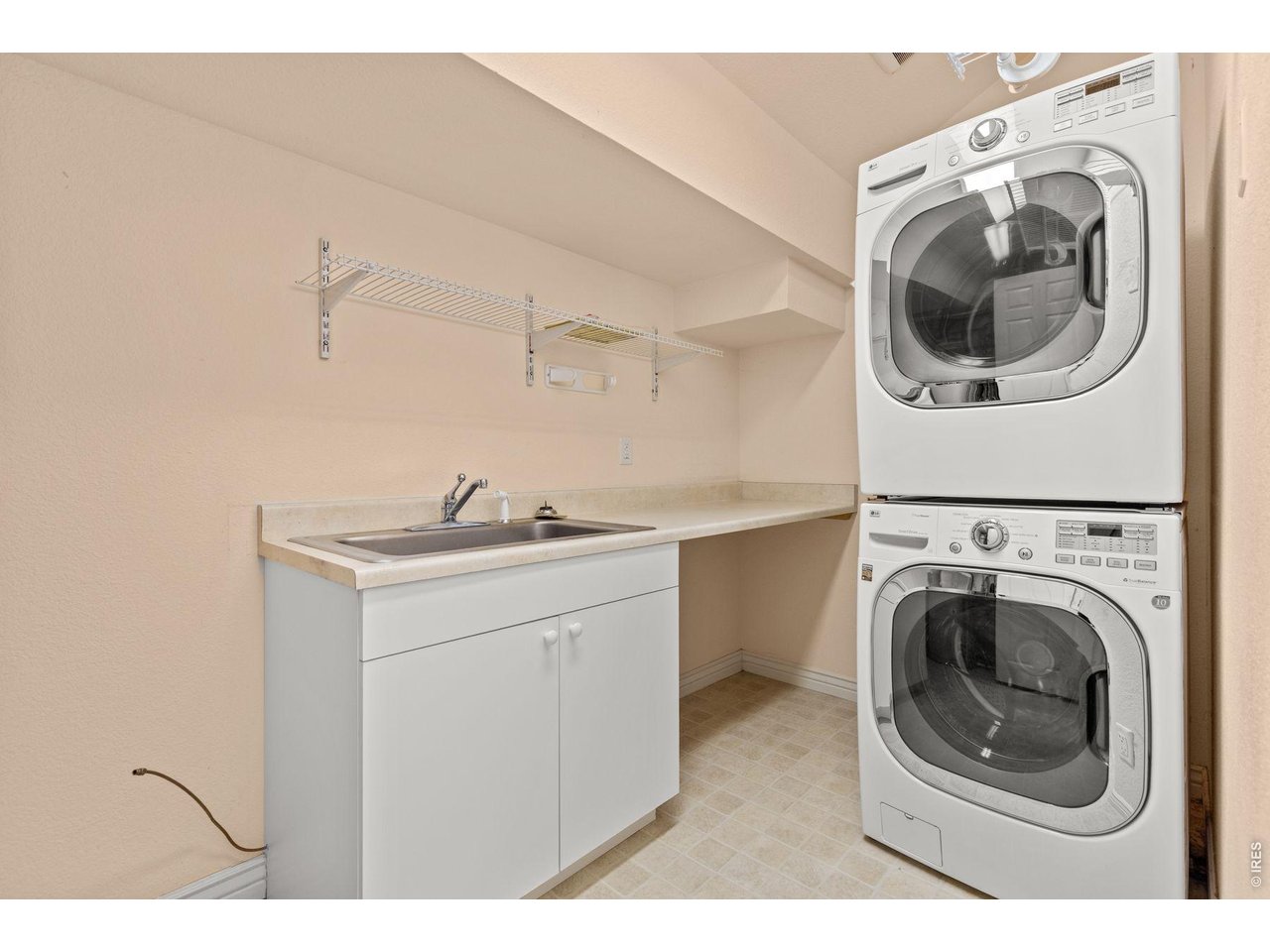 6183 Red Hill Road Boulder, CO 80302 - Photo 17 of 49 a utility room with sink dryer and washer