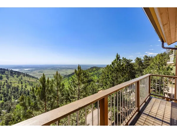 a view of a balcony with outdoor space
