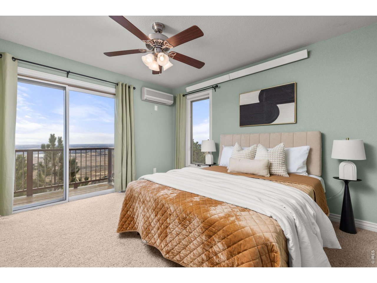 6183 Red Hill Road Boulder, CO 80302 - Photo 41 of 49 a bedroom with a large bed and a chandelier