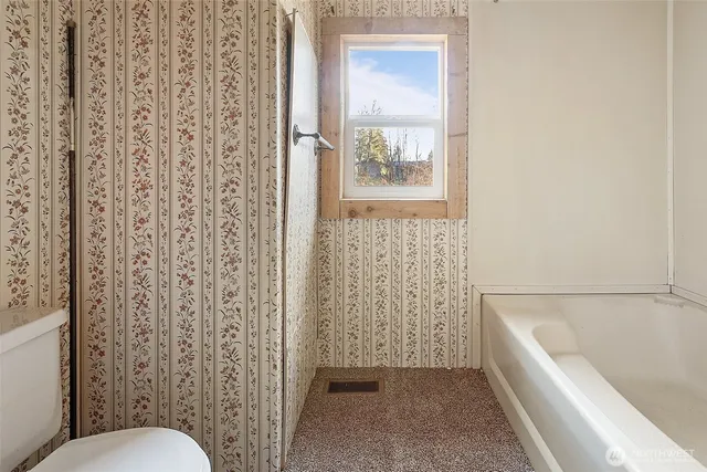 a view of outdoor space with sliding door and wooden floor