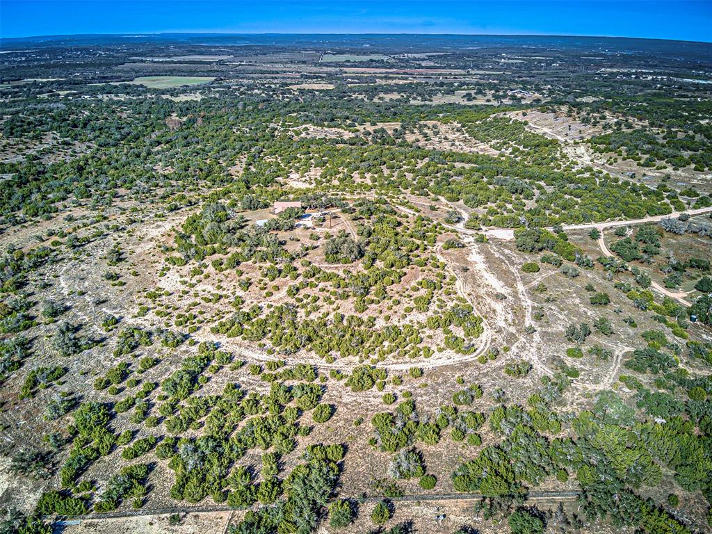 414 Hall Lane Spicewood, TX 78669 - Photo 9 of 16 a view of a green field
