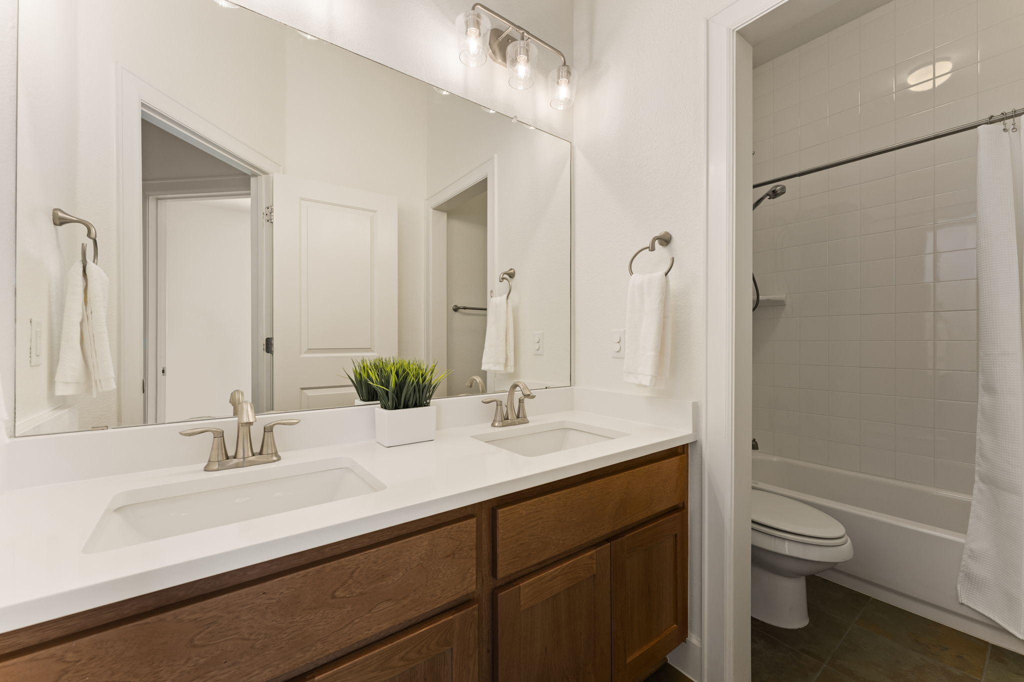 5701 Cherokee Draw Road Austin, TX 78738 - Photo 11 of 33 The full downstairs guest bathroom.