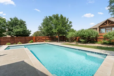 a view of outdoor space yard and swimming pool