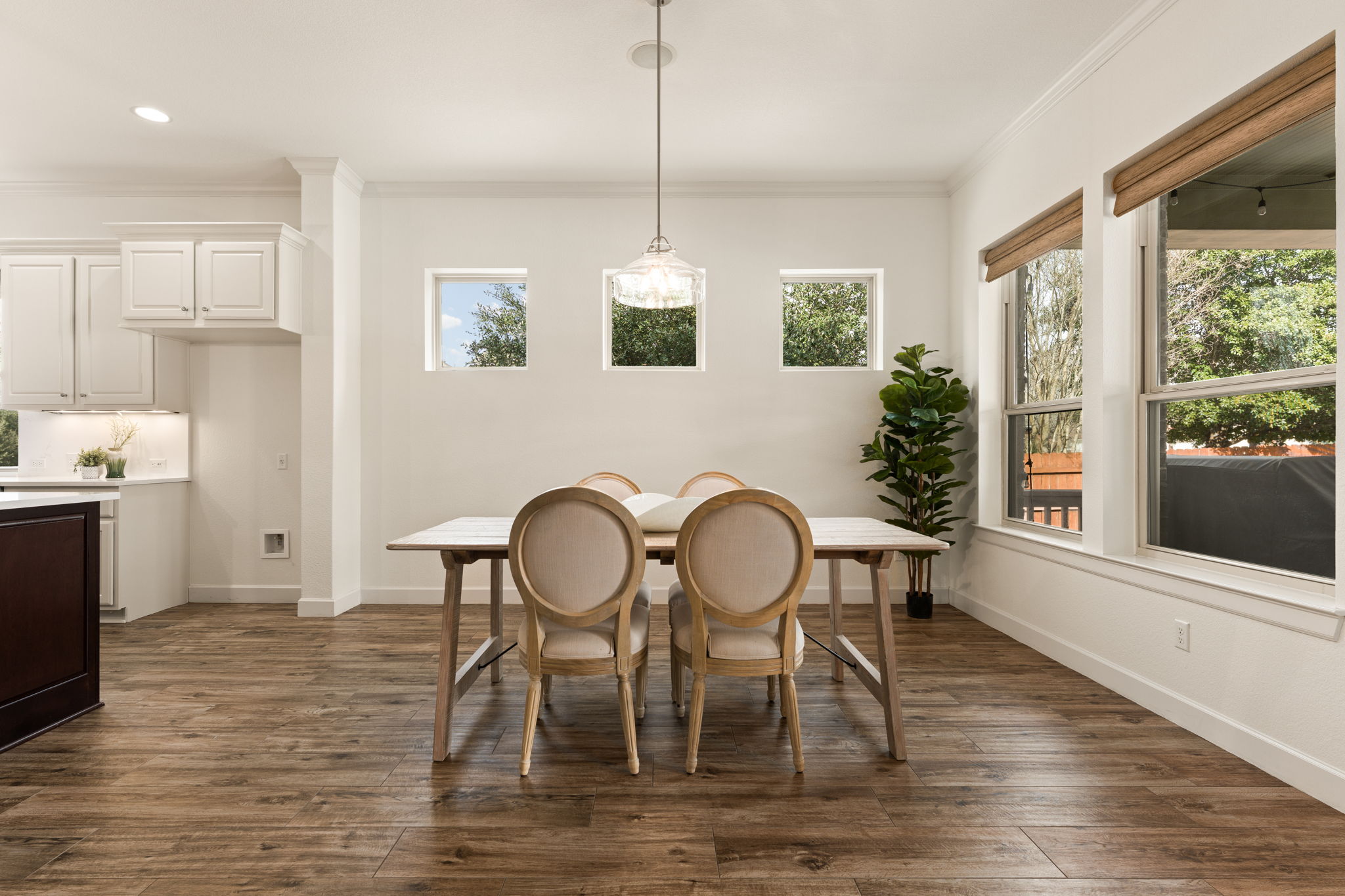 5701 Cherokee Draw Road Austin, TX 78738 - Photo 4 of 33 The dining area overlooks the patio and pool.