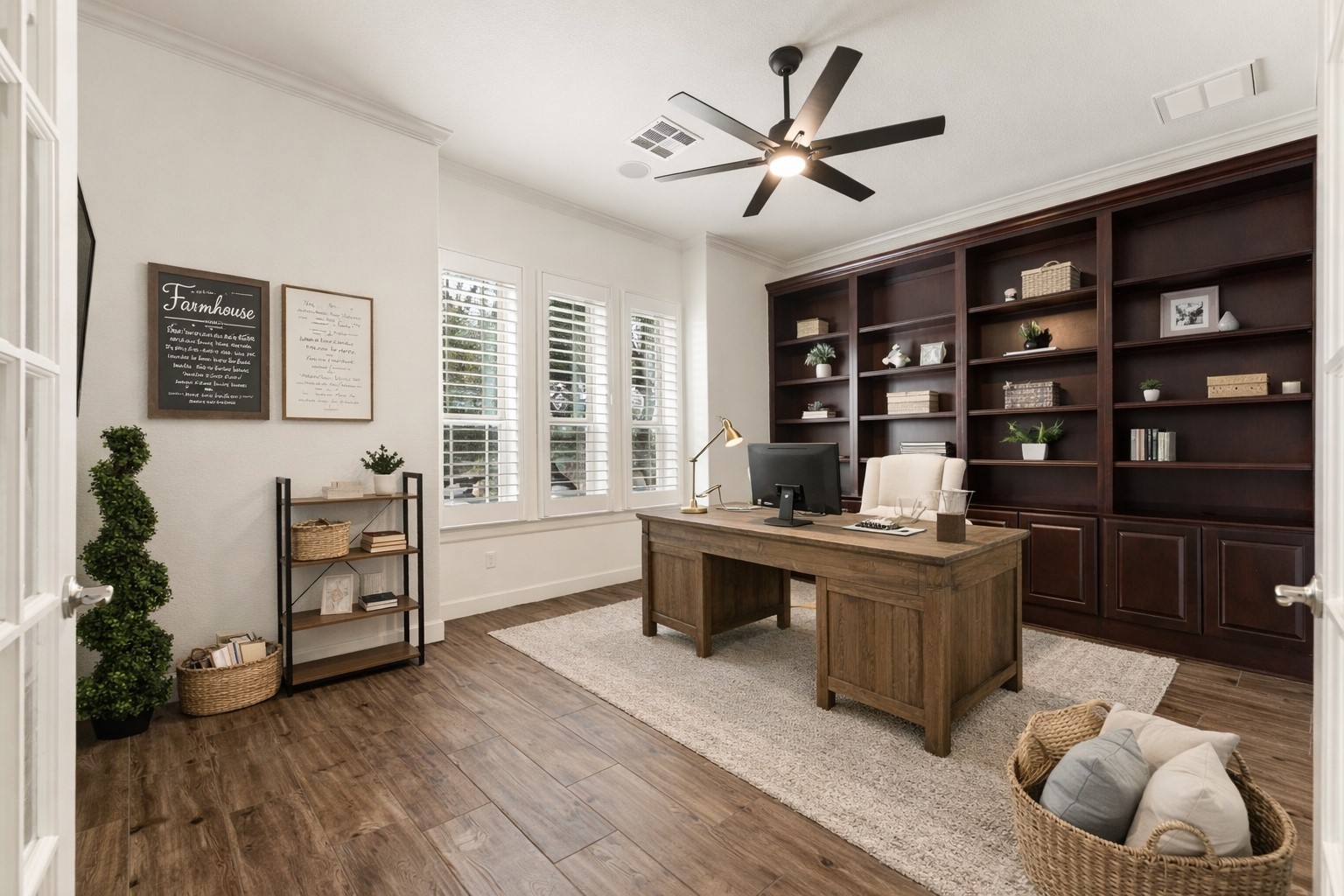 5701 Cherokee Draw Road Austin, TX 78738 - Photo 8 of 33 The home offers a large, dedicated office with a wall of built-ins. Virtually staged.