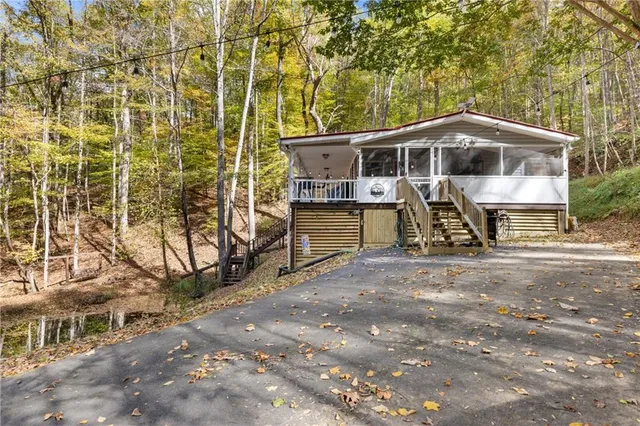 a front view of a house with yard