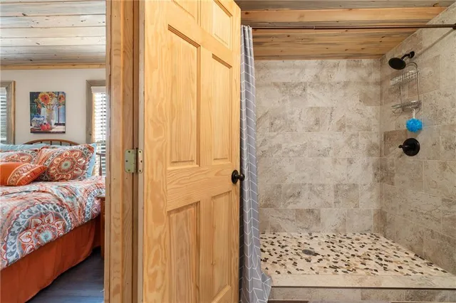 a view of bedroom and bathroom