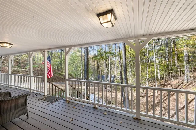 a view of a balcony with wooden floor