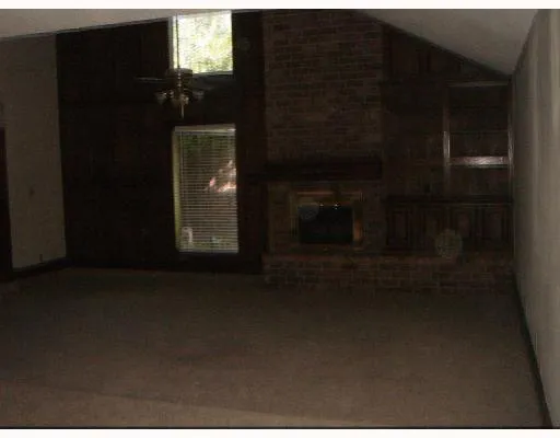 a view of a livingroom with furniture