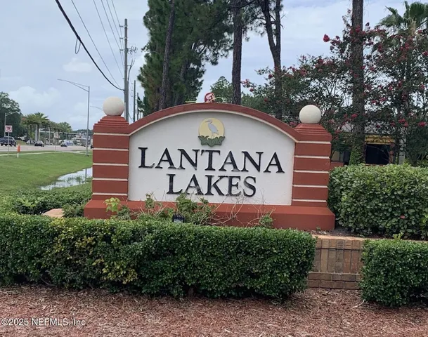 a sign on the side of the road