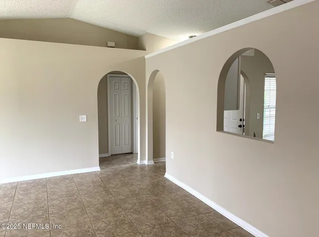 a view of a livingroom with wooden floor