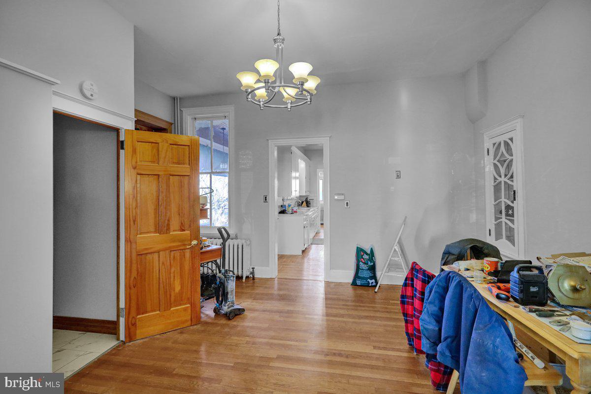 161 West High Street Womelsdorf, PA 19567 - Photo 11 of 37 a view of a room with wooden floor and gym equipment