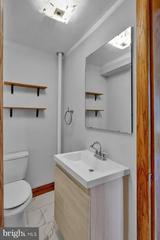 a picture of a bathroom with a shower
