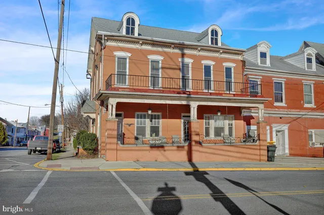 a front view of a building with street