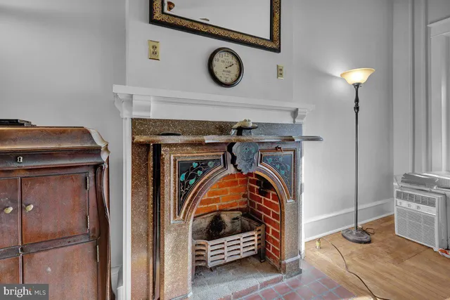 a kitchen with granite countertop a sink stainless steel appliances and cabinets