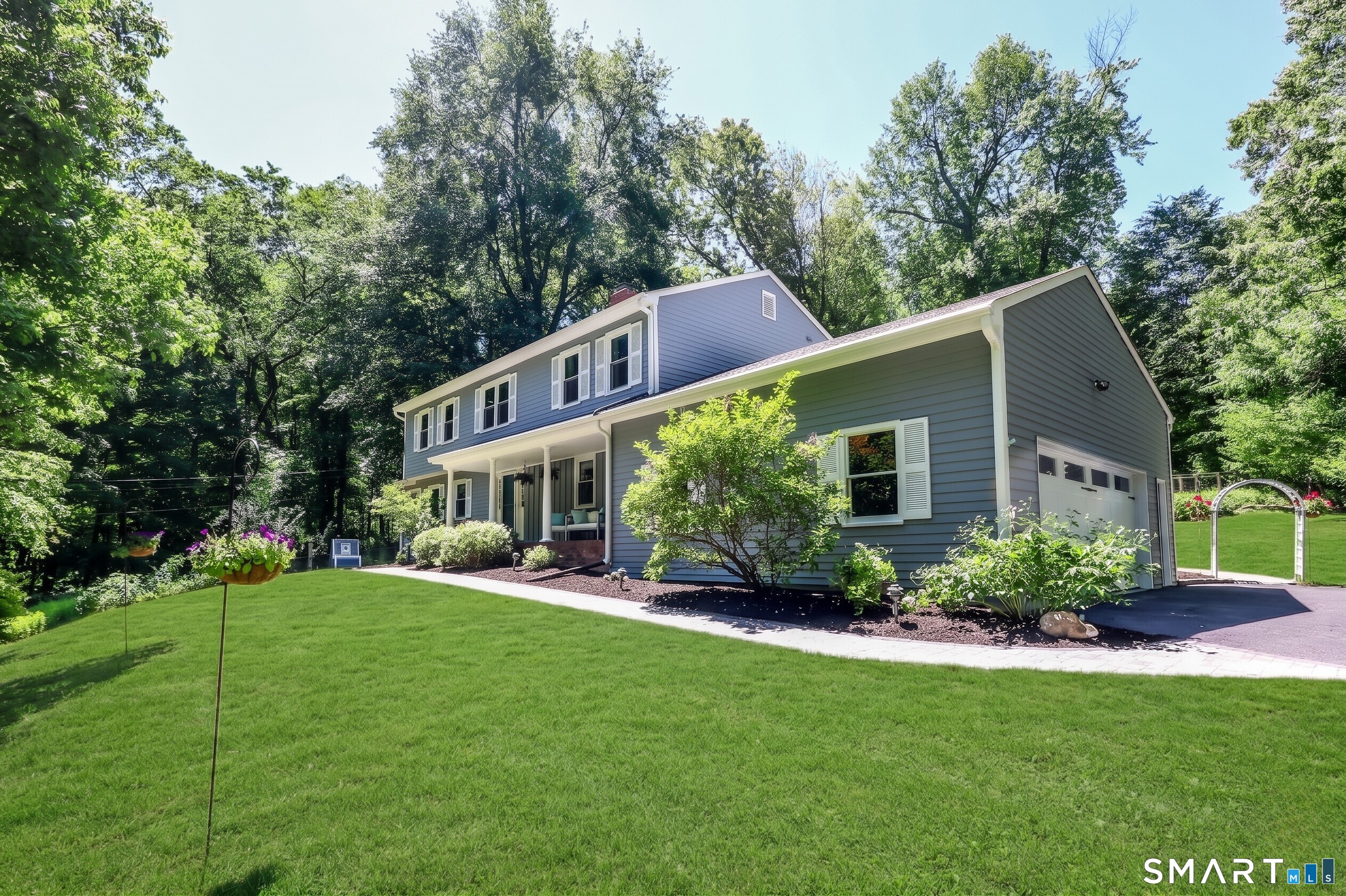 23 Old Green Road Newtown, CT 06482 - Photo 1 of 36 a front view of house with yard and green space
