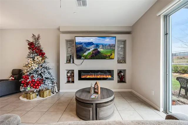a work room with furniture and a window