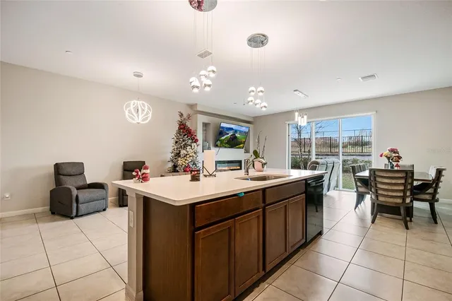 a view of a hallway with a wooden floor and entryway