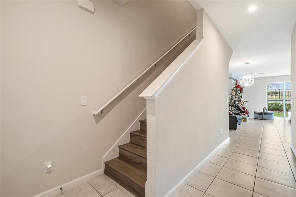 1943 Holden Ridge Ln. Clermont, FL 34715 - Photo 29 of 59 a view of entryway and hall with wooden floor