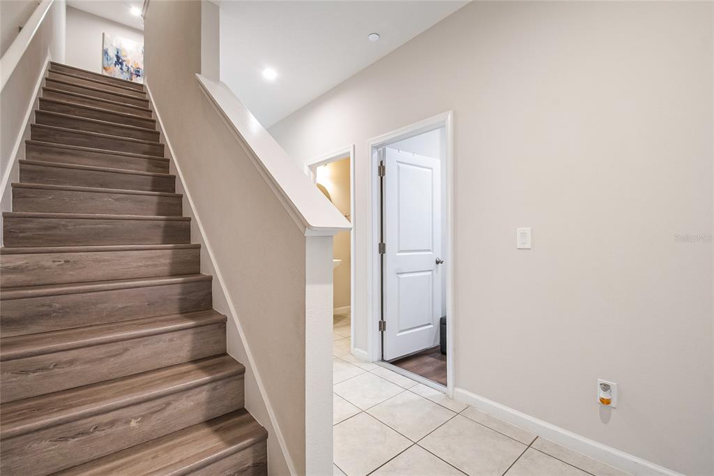 1943 Holden Ridge Ln. Clermont, FL 34715 - Photo 30 of 59 a view of entryway and hall with wooden floor
