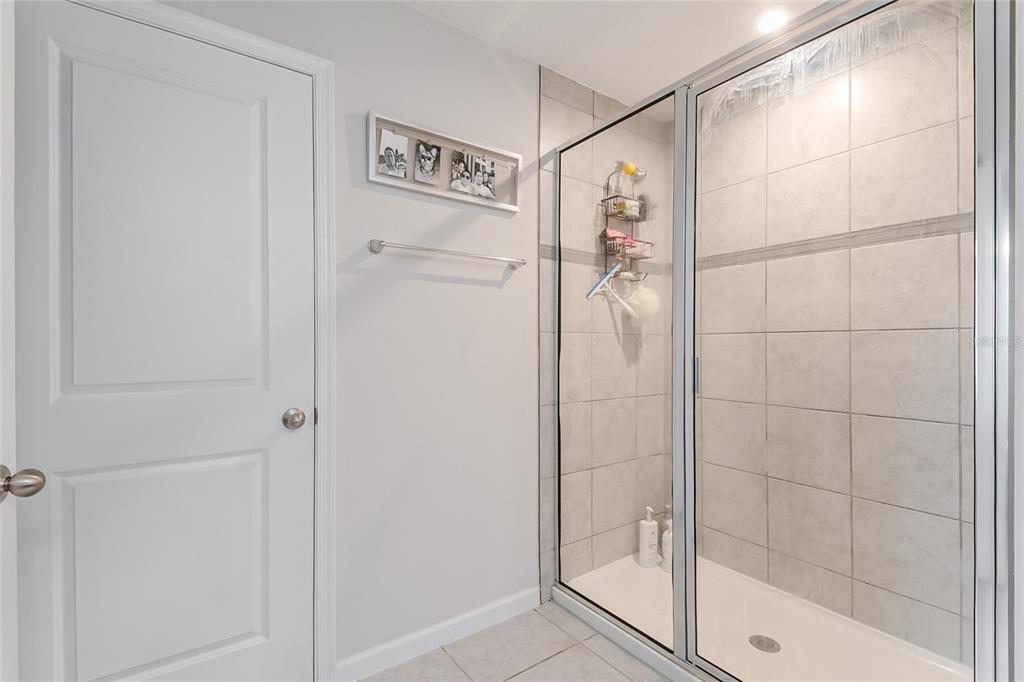 1943 Holden Ridge Ln. Clermont, FL 34715 - Photo 38 of 59 a bathroom with a shower