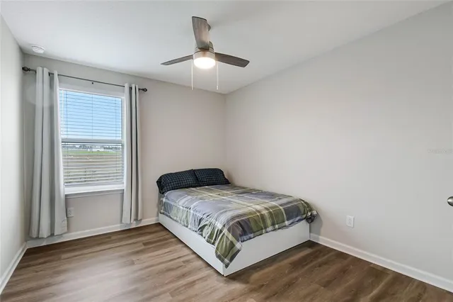 an aerial view of a house with a ocean view