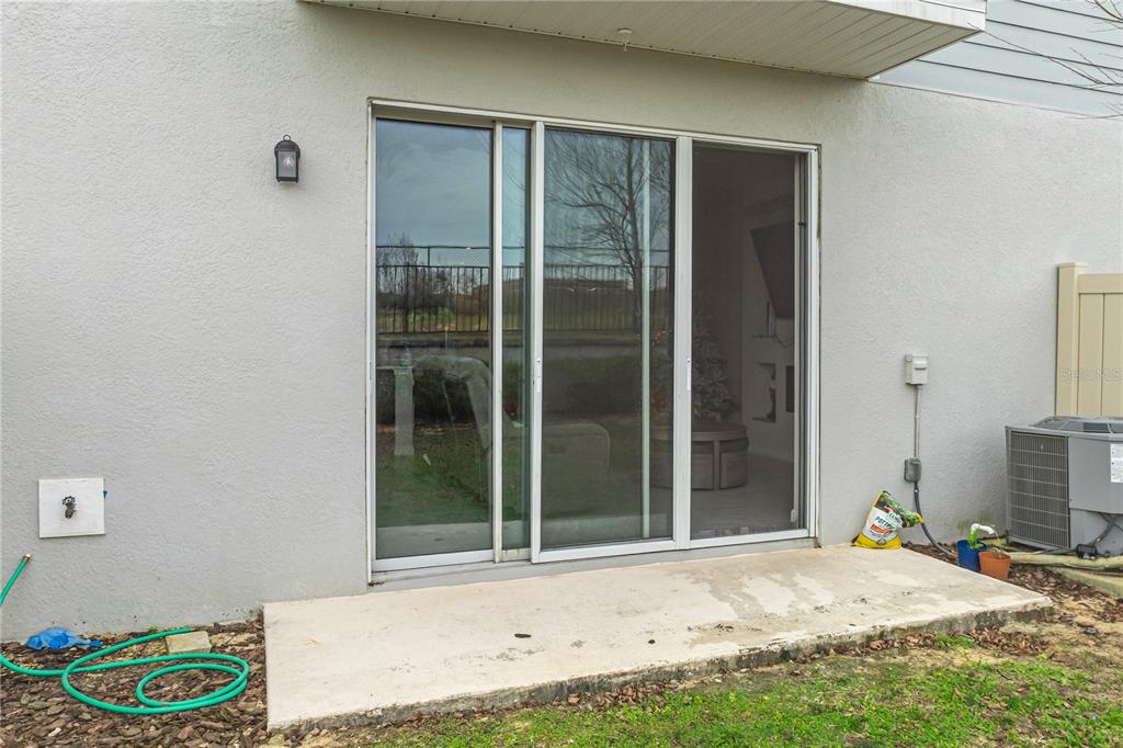 1943 Holden Ridge Ln. Clermont, FL 34715 - Photo 48 of 59 a view of a door front of a house