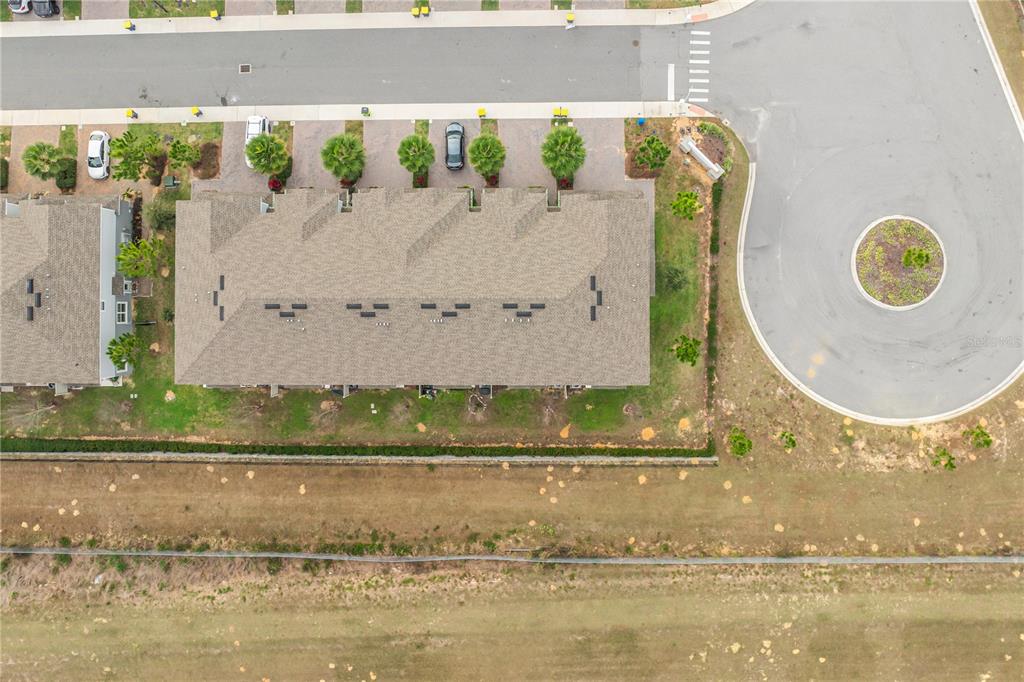 1943 Holden Ridge Ln. Clermont, FL 34715 - Photo 51 of 59 a view of swimming pool and a yard