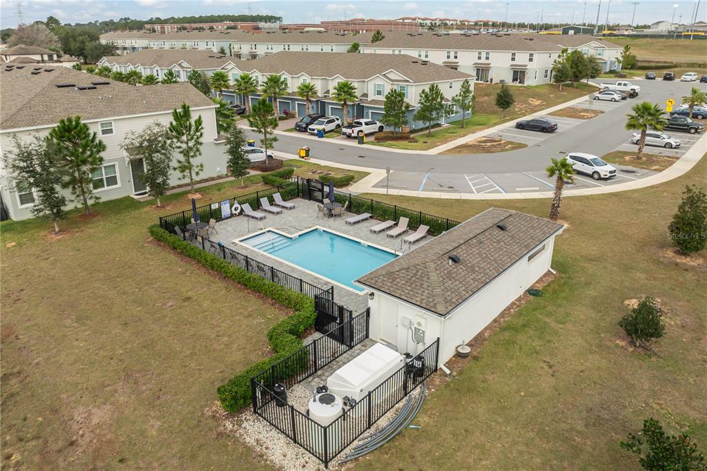 1943 Holden Ridge Ln. Clermont, FL 34715 - Photo 57 of 59 an aerial view of residential houses with outdoor space and ocean view