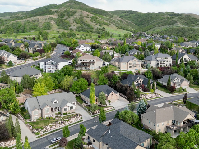 577 South Ridge Top Lane East North Salt Lake, UT 84054 - Photo 56 of 57 A premier location surrounded by custom homes, rolling foothills, and sweeping mountain vistas. Large homesites, mature trees, and abundant open space create a setting that feels both private and prestigious.