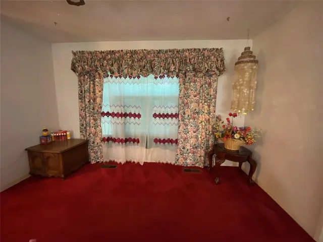 a room with furniture and window