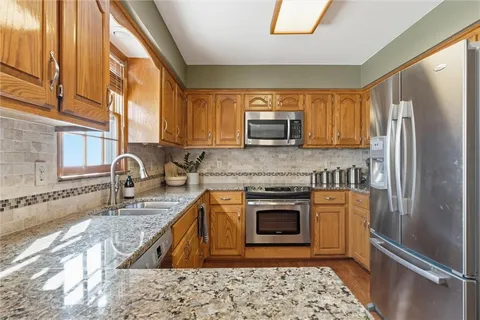 $445,000 | 8641 Greenwood Lane, Lenexa, KS 66215