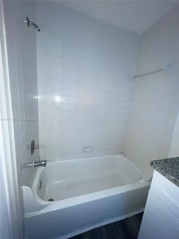 a bathroom with a tub