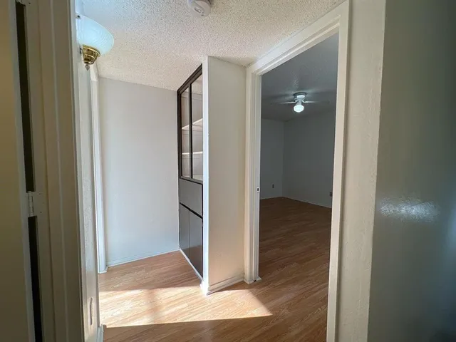 a bathroom with a sink vanity and mirror