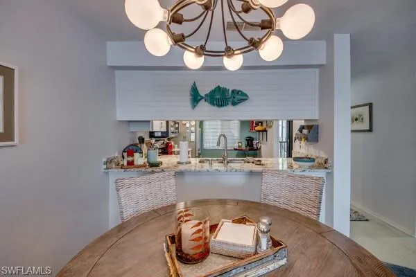 a bathroom with a toilet and a shower curtain