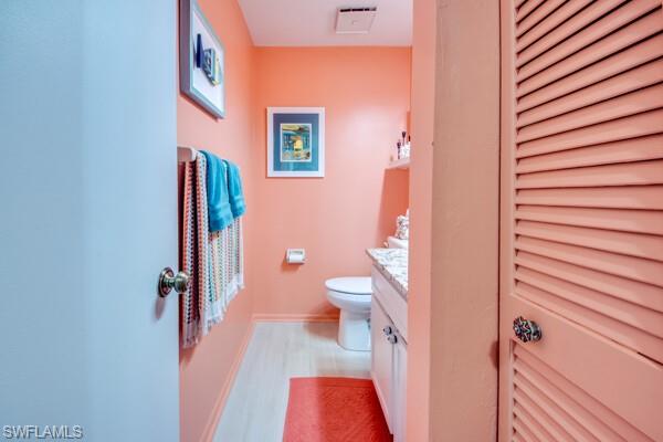 11110 Caravel Circle, Unit 205 Fort Myers, FL 33908 - Photo 15 of 45 a bathroom with a toilet and a shower curtain