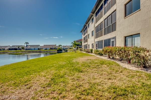 11110 Caravel Circle, Unit 205 Fort Myers, FL 33908 - Photo 27 of 45 a view of residential houses with swimming pool