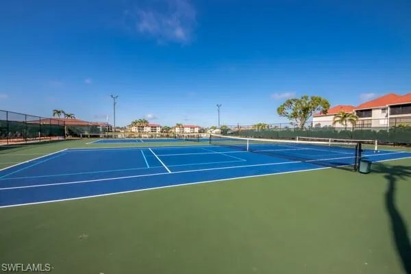 a view of an outdoor space and tennis court
